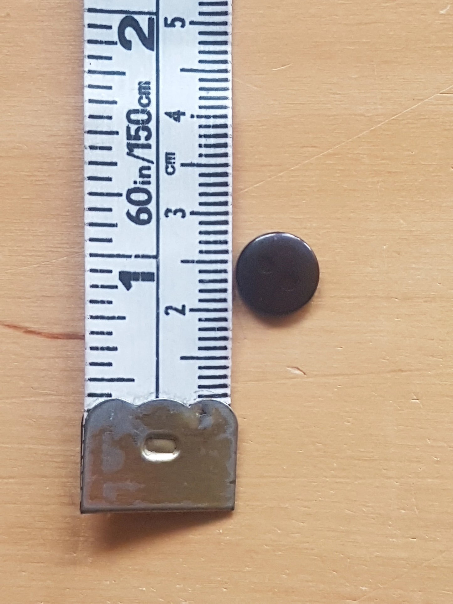 7 Round Buttons Black Plastic 0.75cm