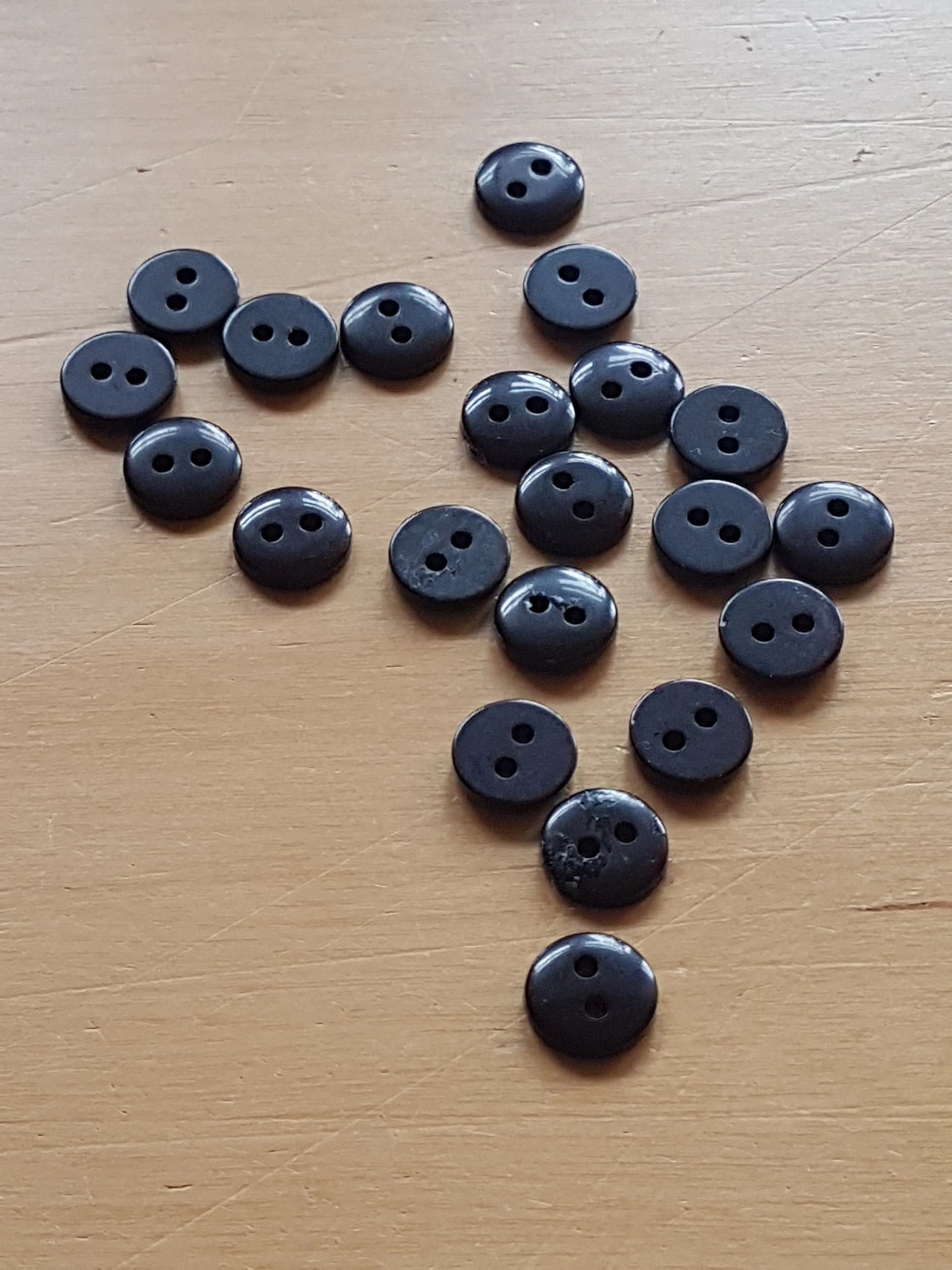 7 Round Buttons Black Plastic 0.75cm