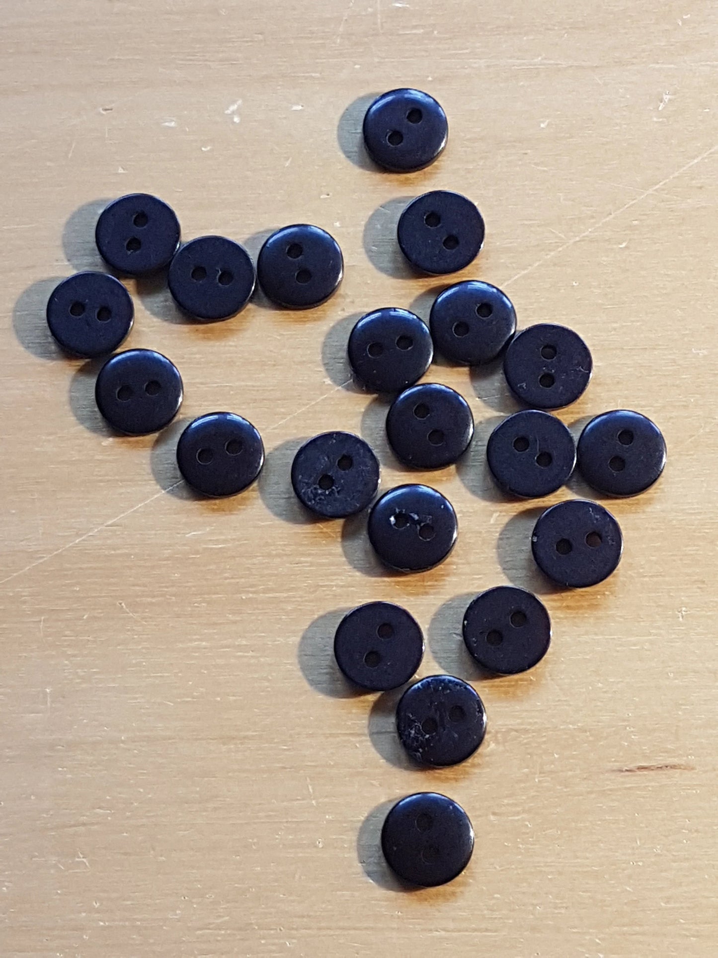 7 Round Buttons Black Plastic 0.75cm
